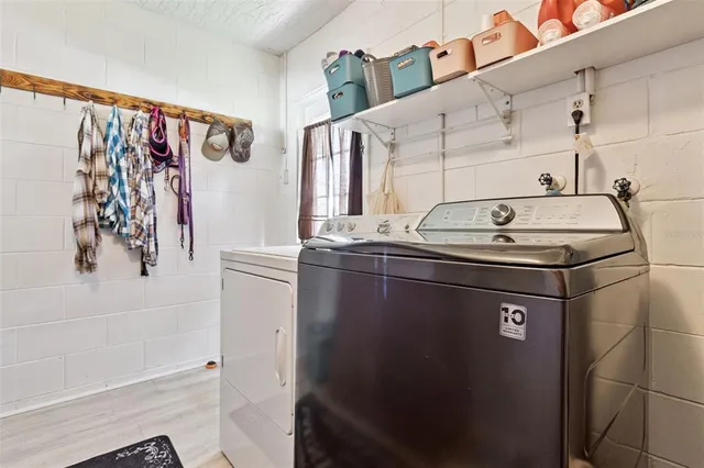 a utility room with dryer and washer