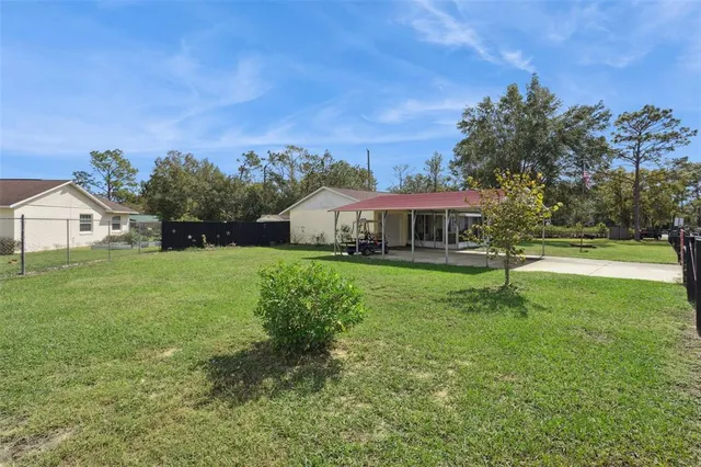 a house view with a garden space