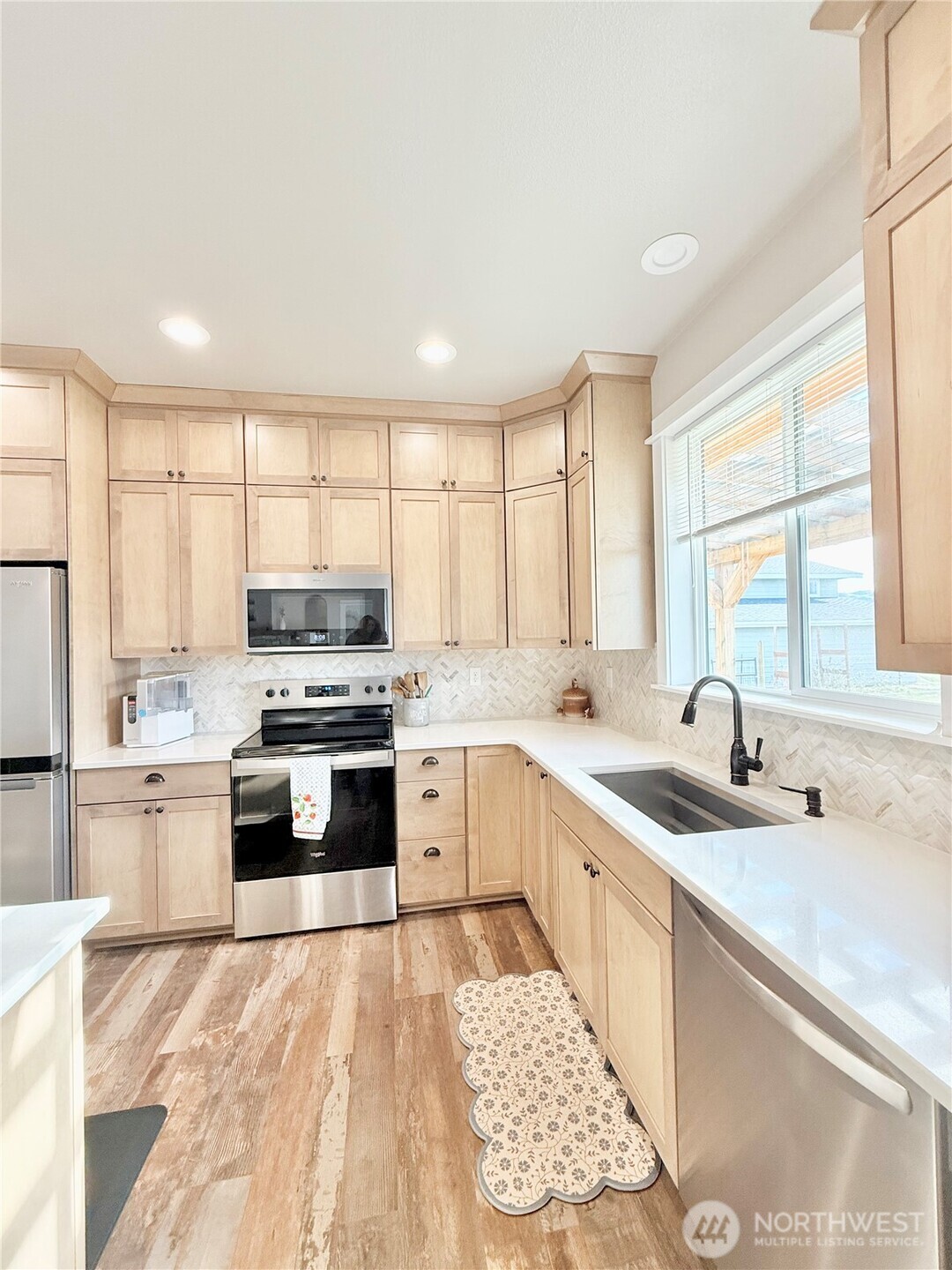 103 Johnson Creek Road Omak, WA 98841 - Photo 21 of 40 a kitchen with a sink stove top oven and refrigerator
