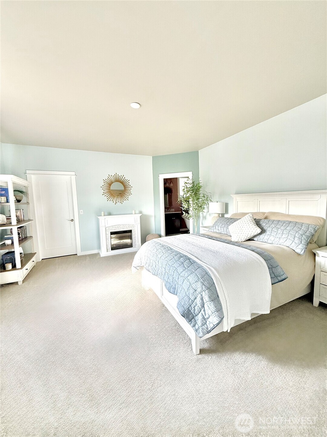103 Johnson Creek Road Omak, WA 98841 - Photo 26 of 40 a spacious bedroom with a bed and a desk