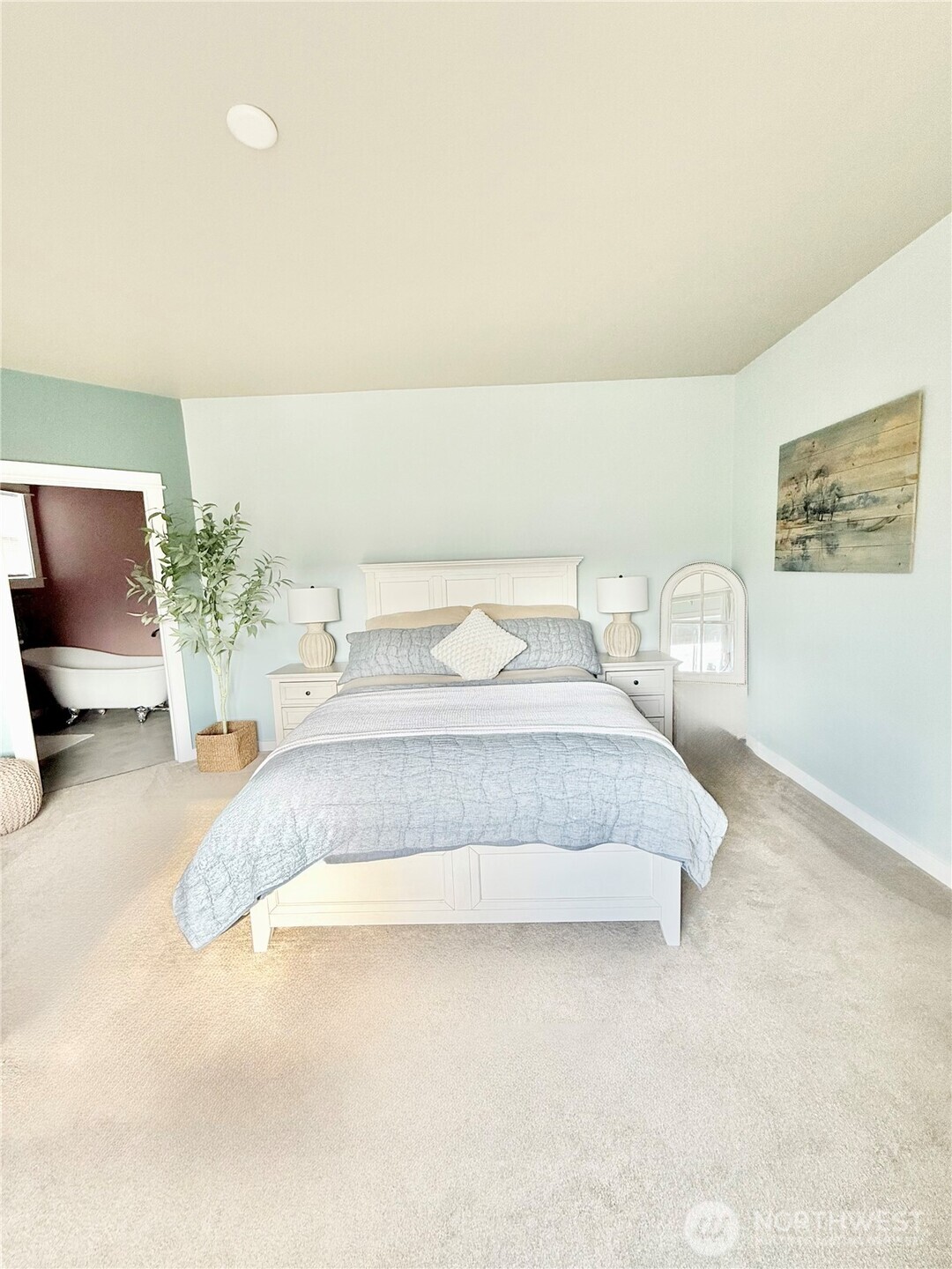 103 Johnson Creek Road Omak, WA 98841 - Photo 27 of 40 a bedroom with a bed and lamp