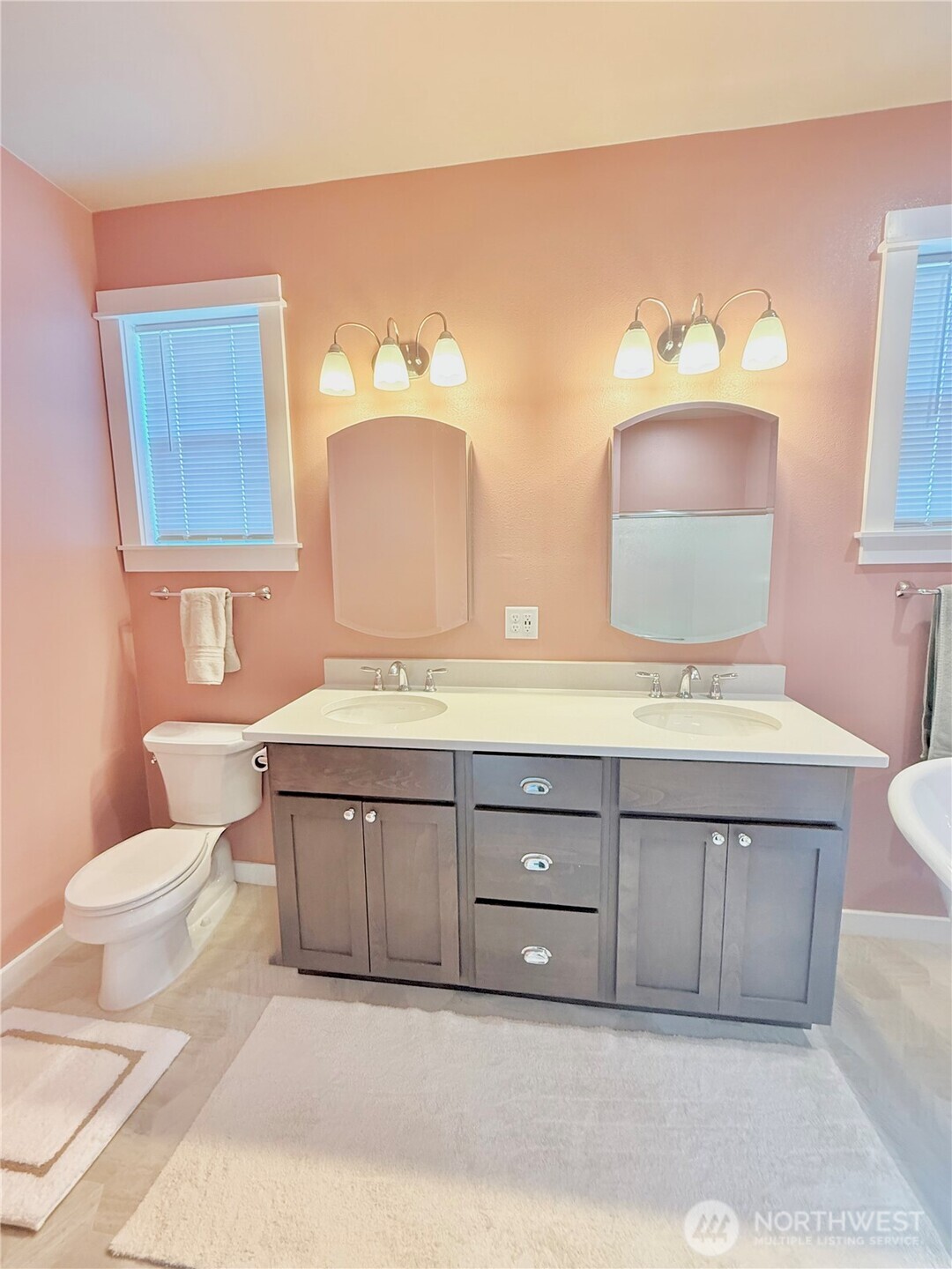103 Johnson Creek Road Omak, WA 98841 - Photo 30 of 40 a bathroom with a granite countertop double vanity sink and a mirror
