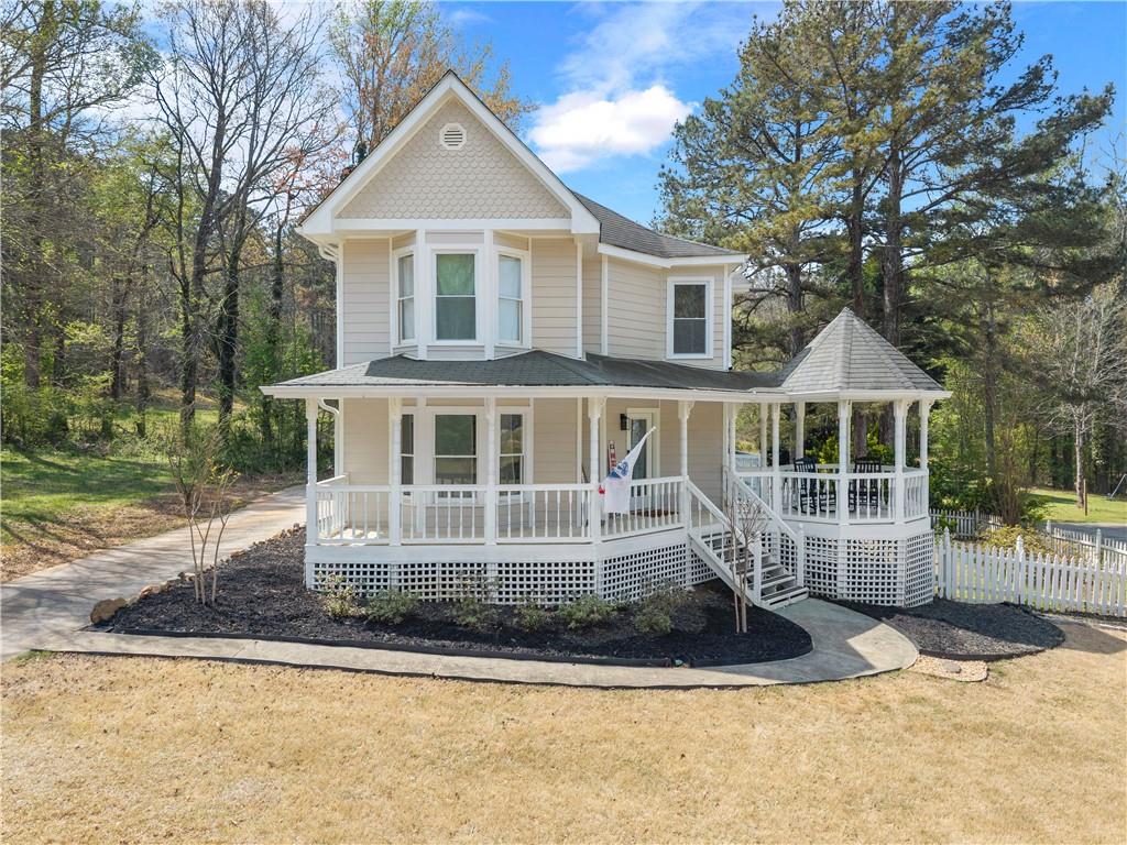 322 Wyngate Road Auburn, GA 30011 - Photo 1 of 44 a front view of a house with a yard
