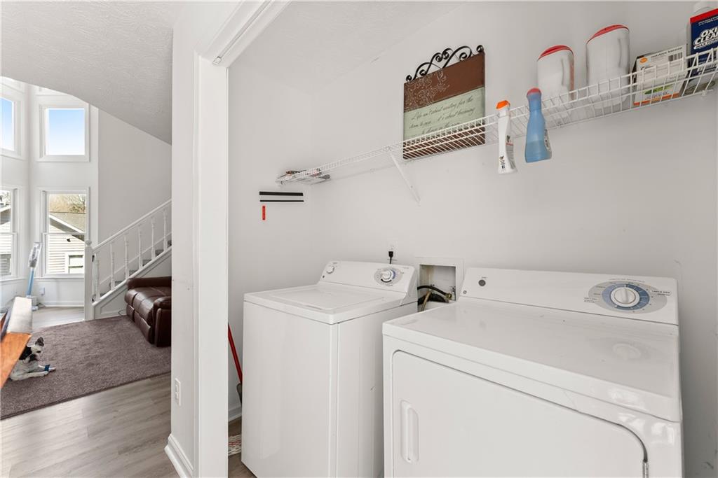 322 Wyngate Road Auburn, GA 30011 - Photo 15 of 44 a utility room with dryer and washer