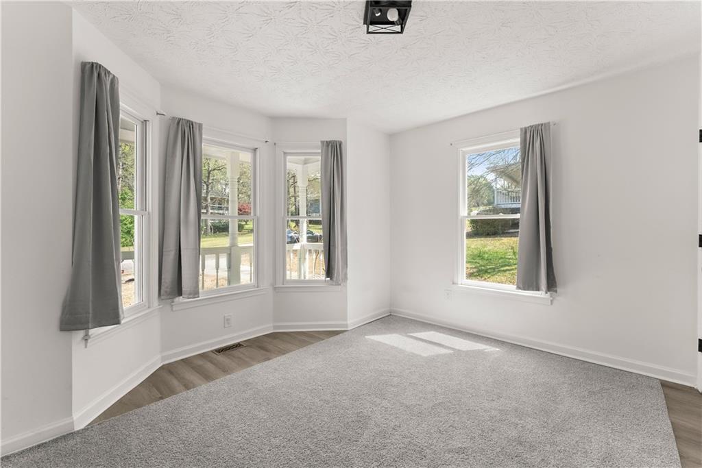 322 Wyngate Road Auburn, GA 30011 - Photo 20 of 44 an empty room with a window