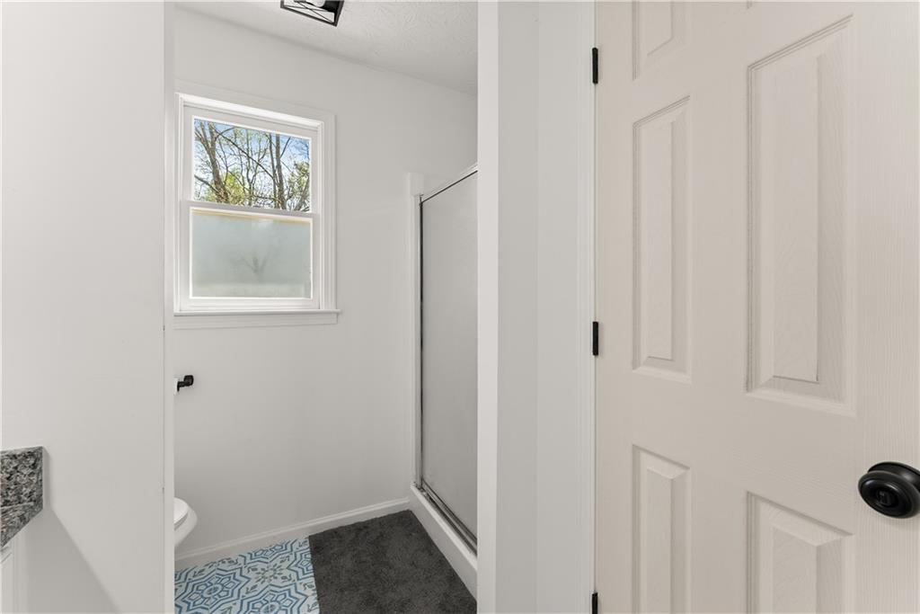 322 Wyngate Road Auburn, GA 30011 - Photo 28 of 44 a view of hallway with window