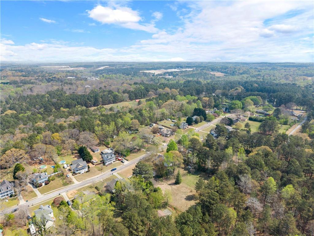 322 Wyngate Road Auburn, GA 30011 - Photo 43 of 44 an aerial view of residential building with green space