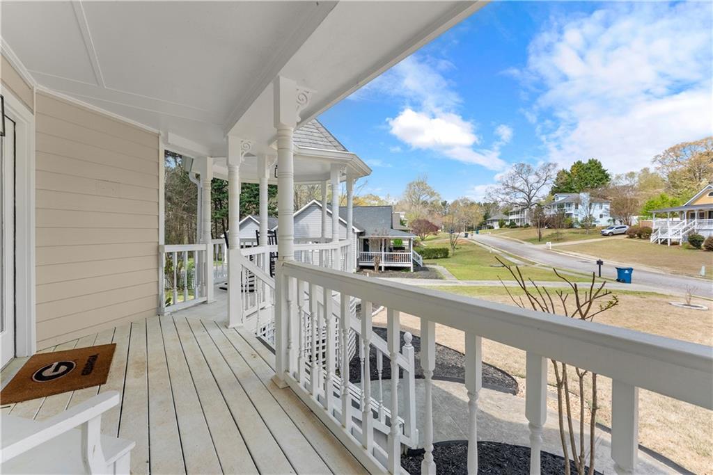 322 Wyngate Road Auburn, GA 30011 - Photo 10 of 44 a view of a balcony with wooden floor
