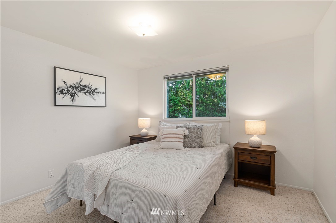 924 217th Street Southwest Bothell, WA 98021 - Photo 15 of 30 a bedroom with a bed and a window