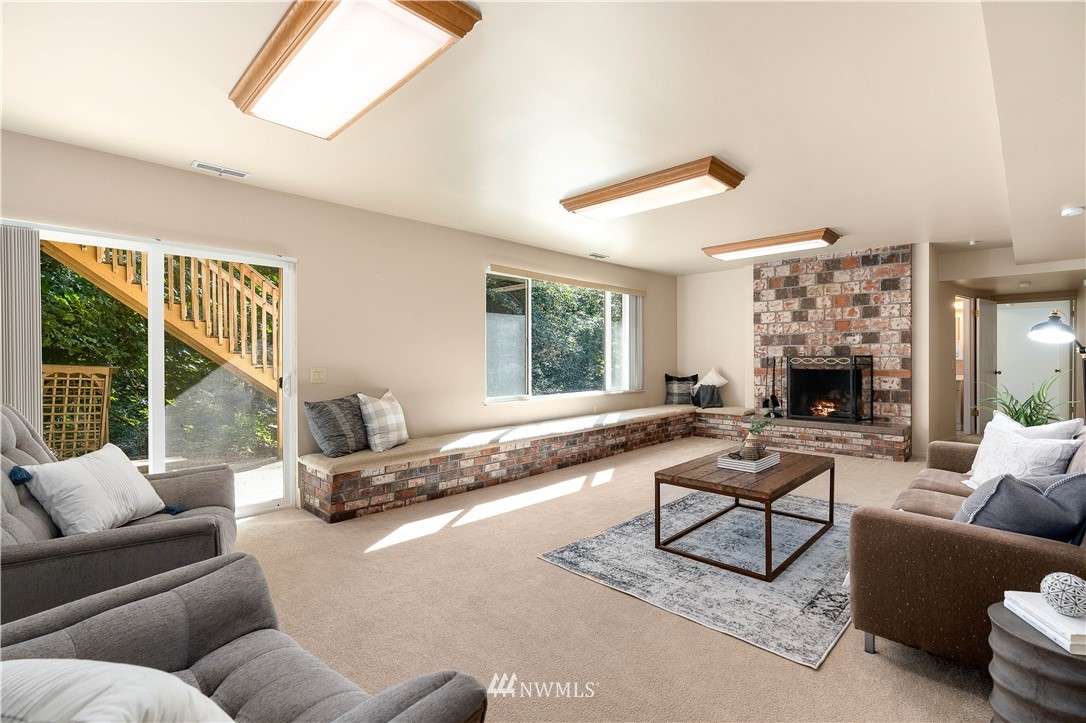 924 217th Street Southwest Bothell, WA 98021 - Photo 19 of 30 a living room with furniture and a large window