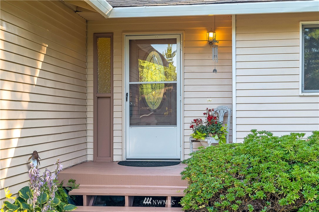924 217th Street Southwest Bothell, WA 98021 - Photo 3 of 30 a view of a entryway door front of house