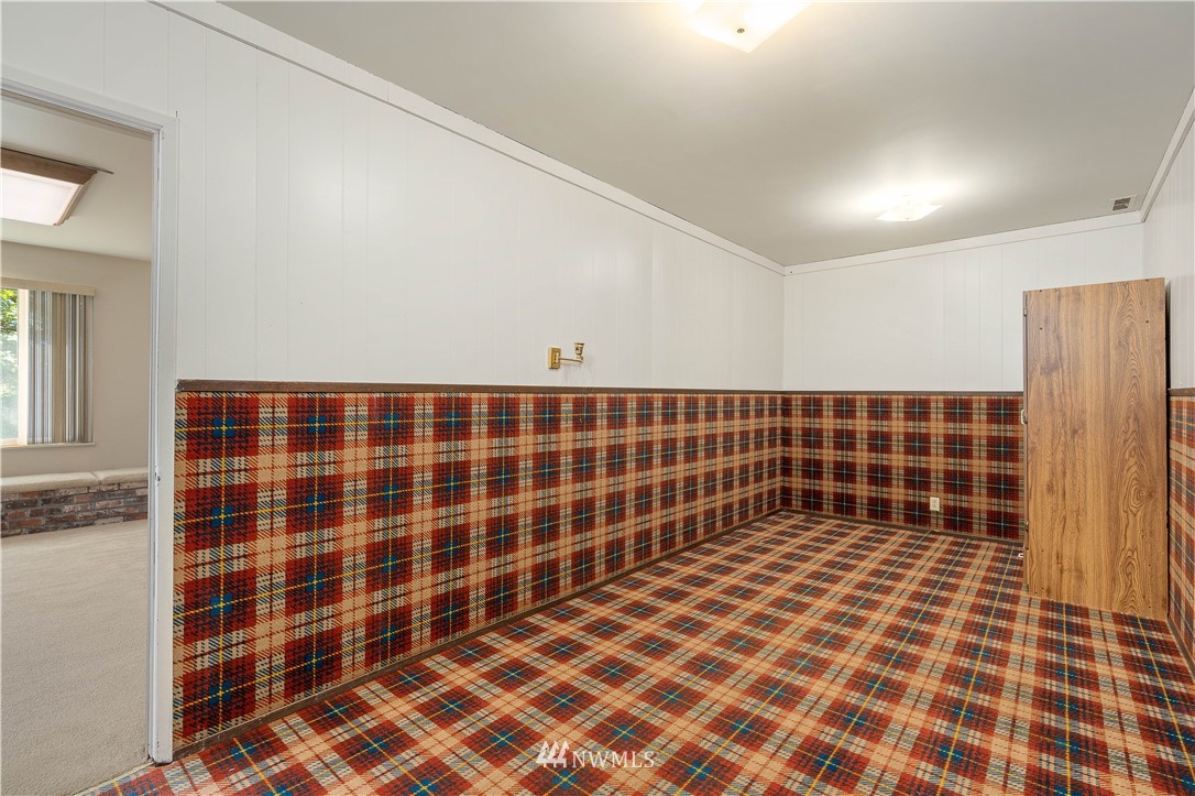 924 217th Street Southwest Bothell, WA 98021 - Photo 22 of 30 a bathroom with a black white checkered floor
