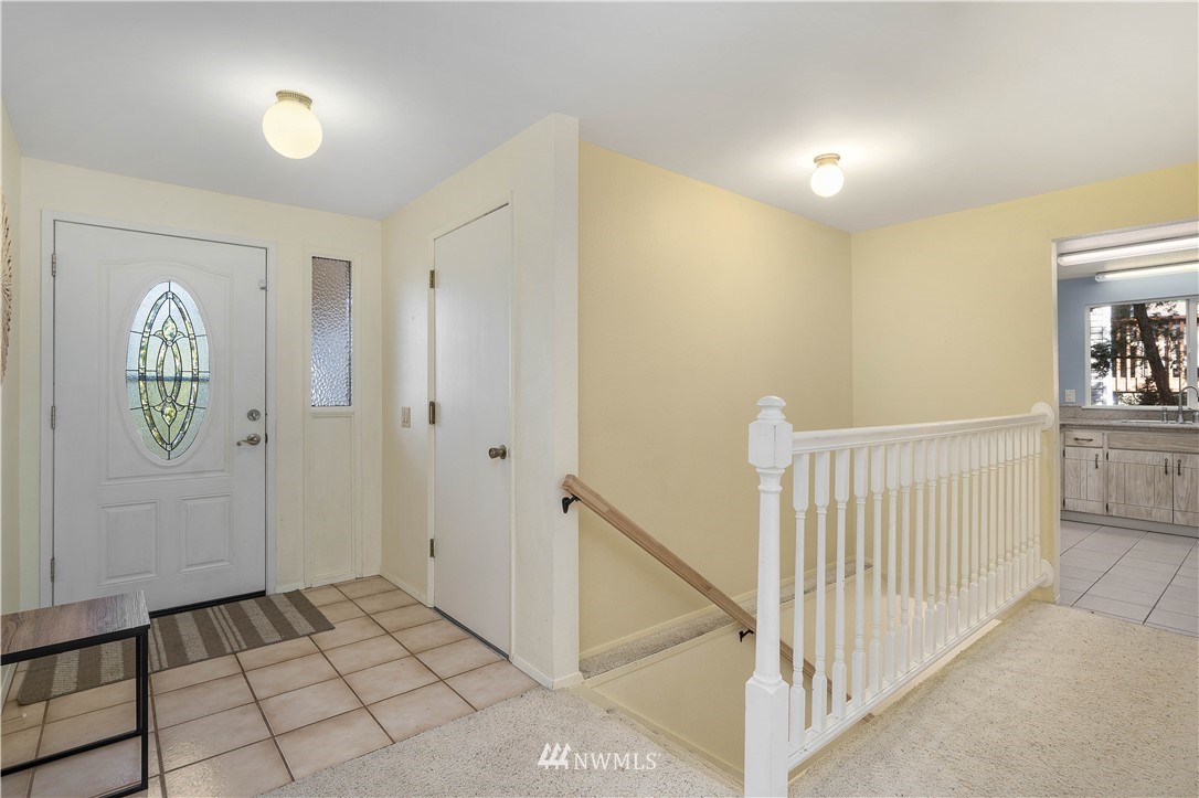 924 217th Street Southwest Bothell, WA 98021 - Photo 4 of 30 a view of a hallway with entryway