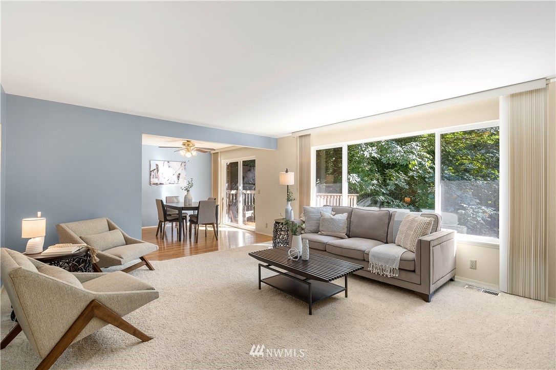 924 217th Street Southwest Bothell, WA 98021 - Photo 5 of 30 a living room with furniture and a large window