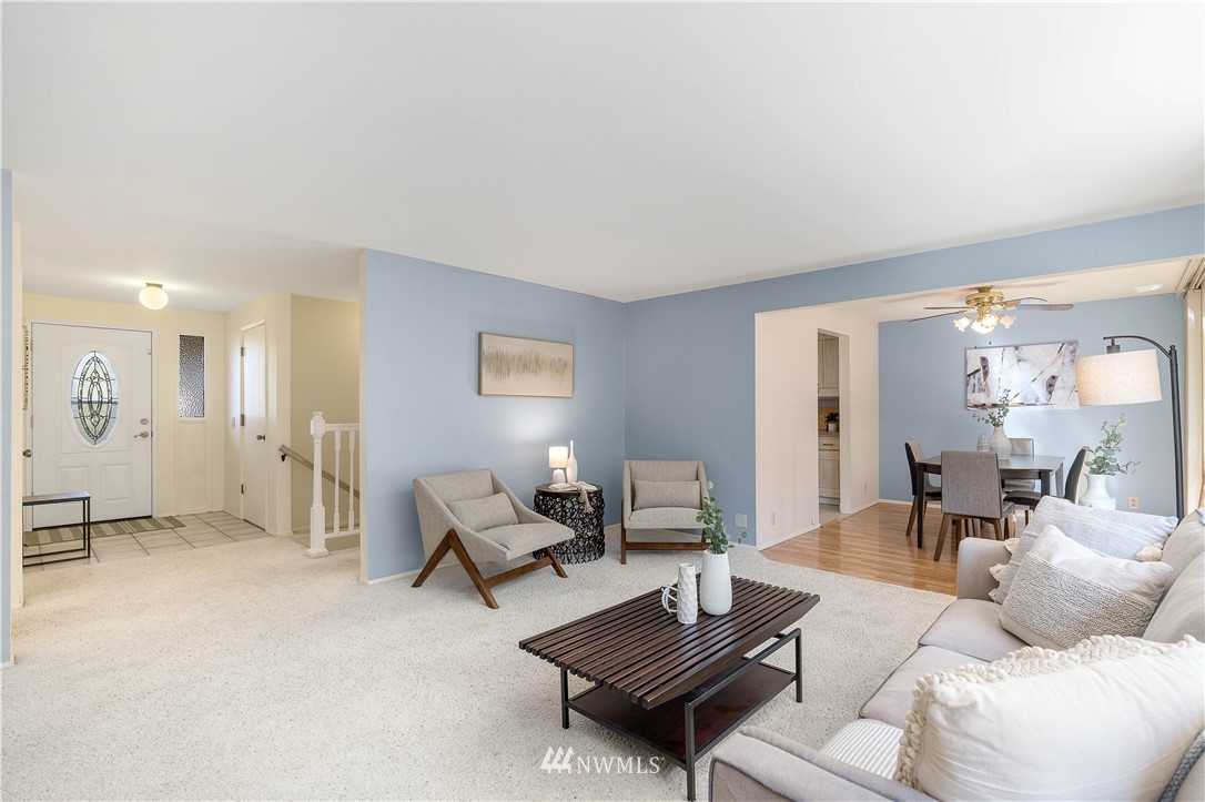 924 217th Street Southwest Bothell, WA 98021 - Photo 6 of 30 a living room with furniture and a table