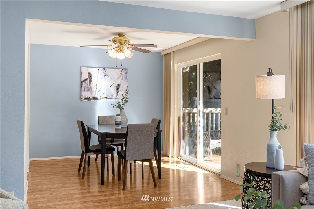 924 217th Street Southwest Bothell, WA 98021 - Photo 7 of 30 a view of a dining room with furniture wooden floor and chandelier
