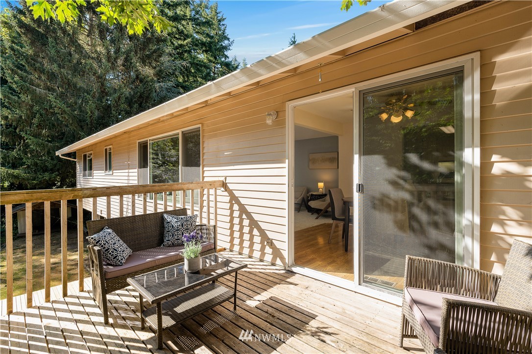 924 217th Street Southwest Bothell, WA 98021 - Photo 8 of 30 a balcony with table and chairs