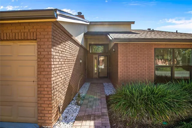 a view of a pathway along the building