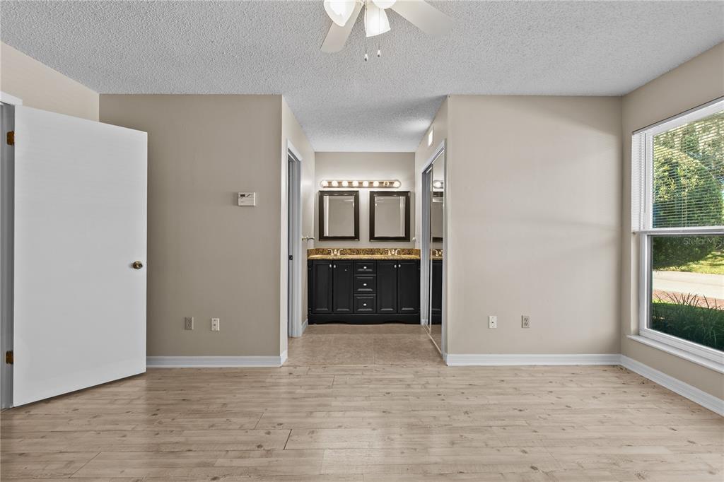 111 Feather Edge Loop, Unit 4B Lake Mary, FL 32746 - Photo 14 of 27 a view of a kitchen with a sink and a refrigerator