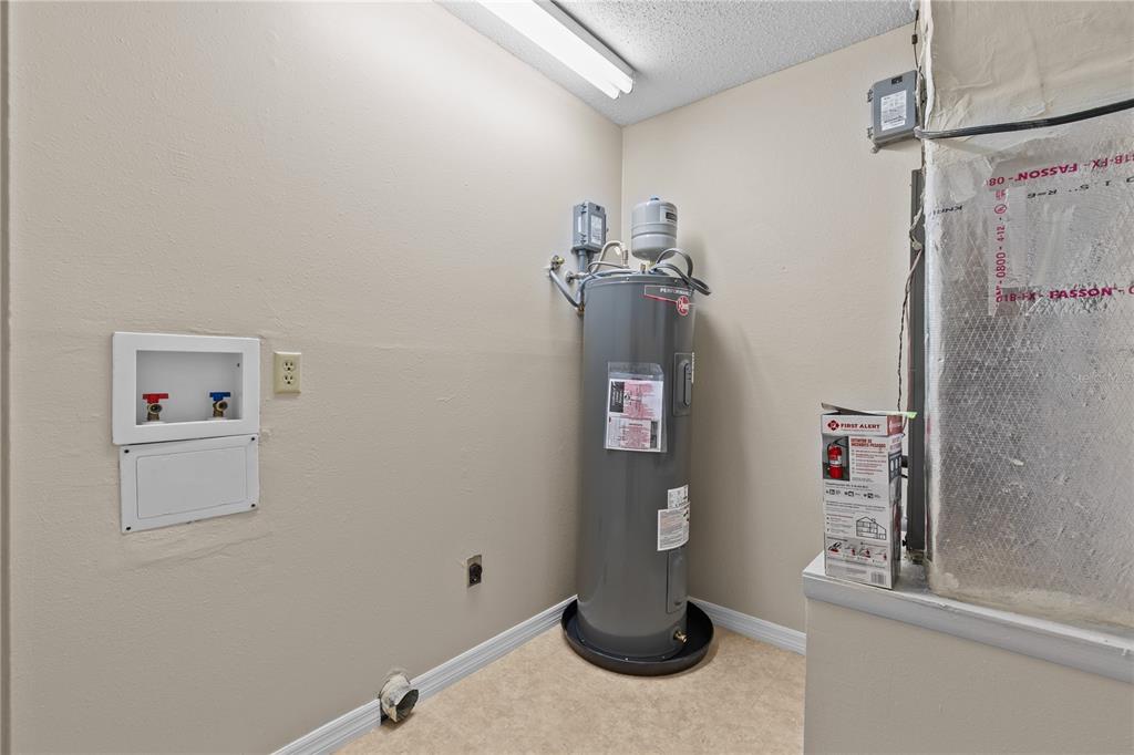 111 Feather Edge Loop, Unit 4B Lake Mary, FL 32746 - Photo 18 of 27 a bathroom with a sink and shower