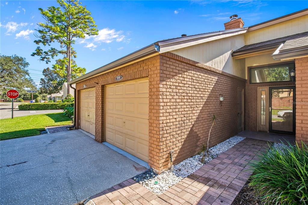 111 Feather Edge Loop, Unit 4B Lake Mary, FL 32746 - Photo 2 of 27 a view of a house with a backyard