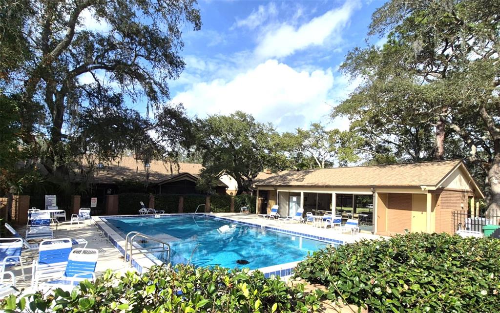 111 Feather Edge Loop, Unit 4B Lake Mary, FL 32746 - Photo 26 of 27 a front view of house with yard and green space