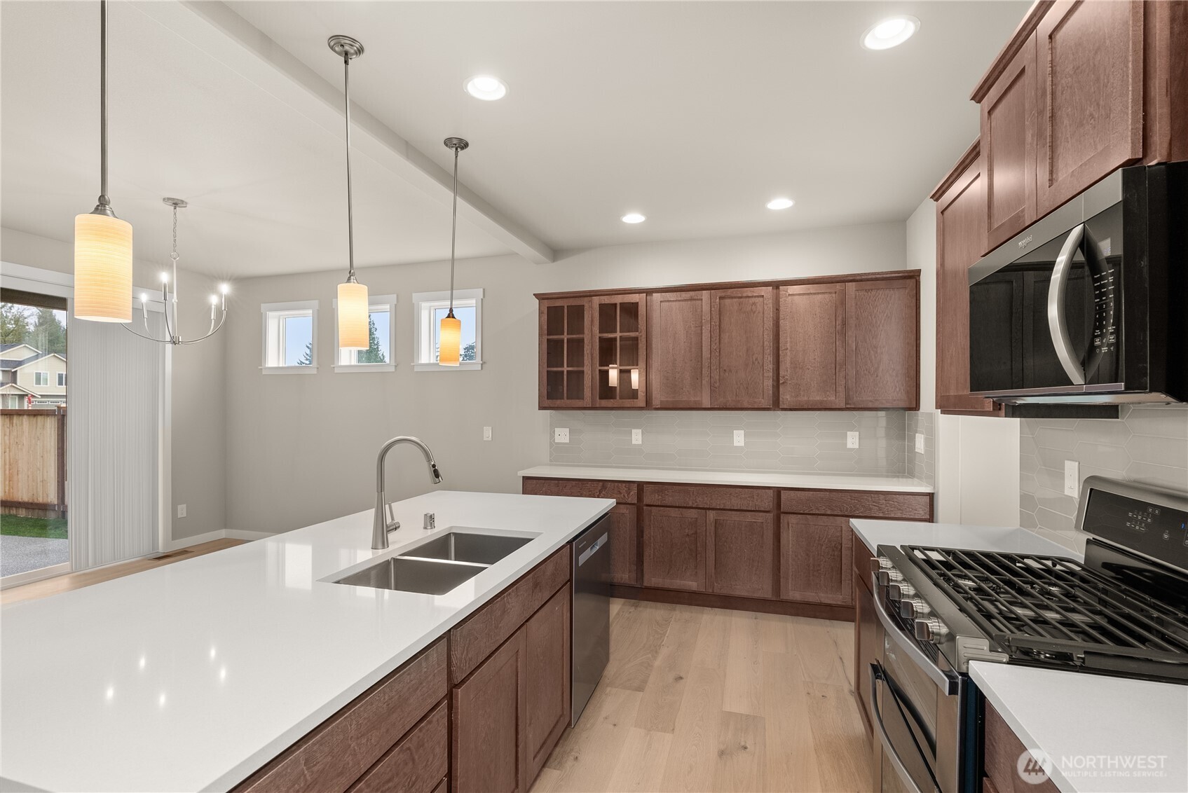 7308 Jenner Street Southwest Tumwater, WA 98512 - Photo 12 of 34 a kitchen with lots of counter space and a sink