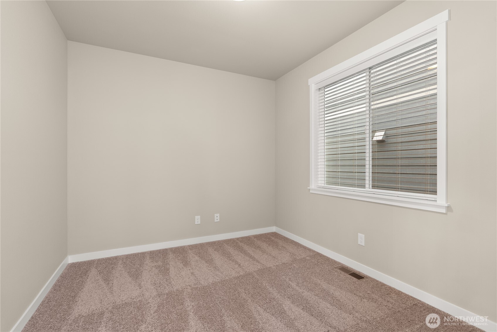 7308 Jenner Street Southwest Tumwater, WA 98512 - Photo 22 of 34 an empty room with a window