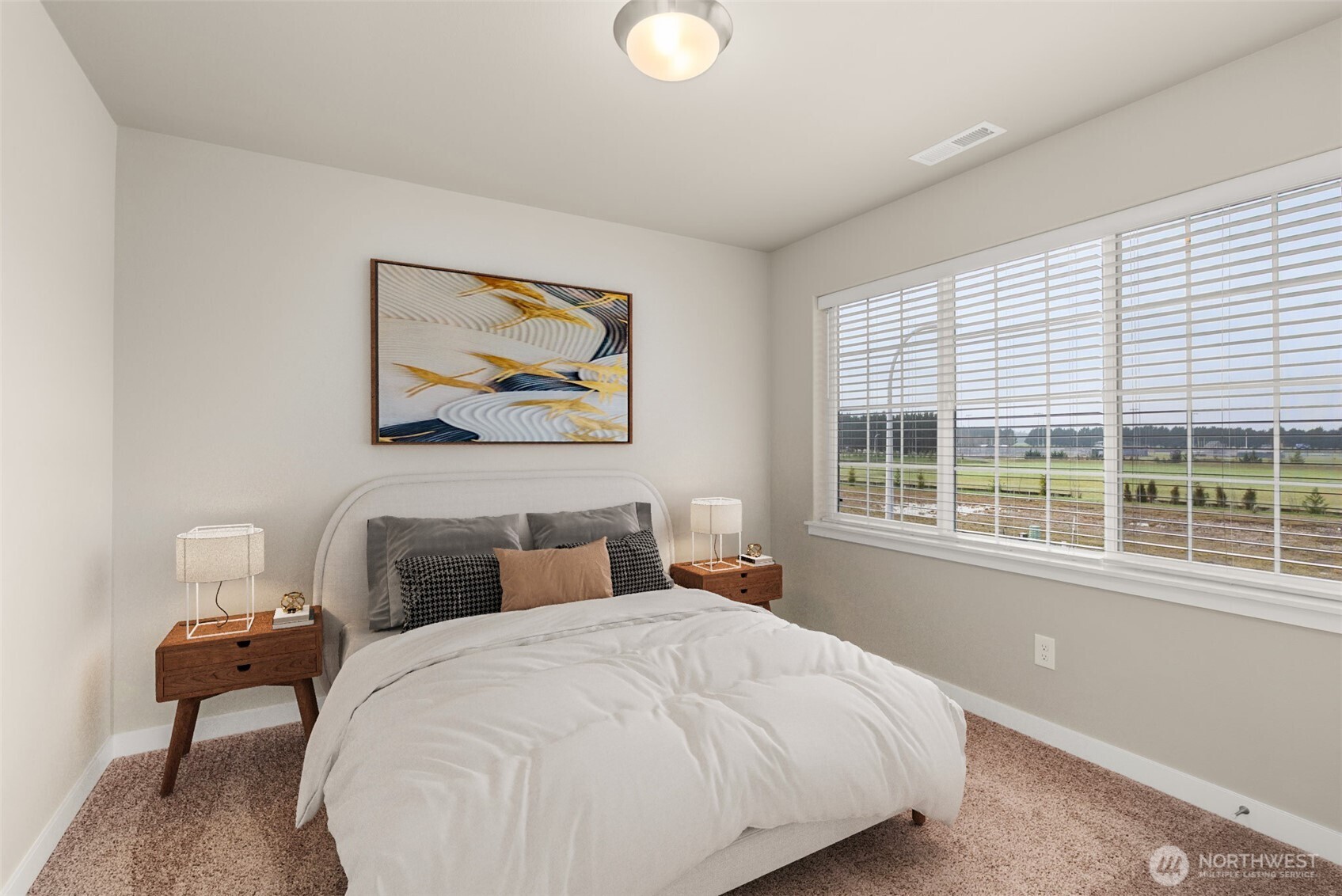 7308 Jenner Street Southwest Tumwater, WA 98512 - Photo 23 of 40 a bedroom with bed and a large window