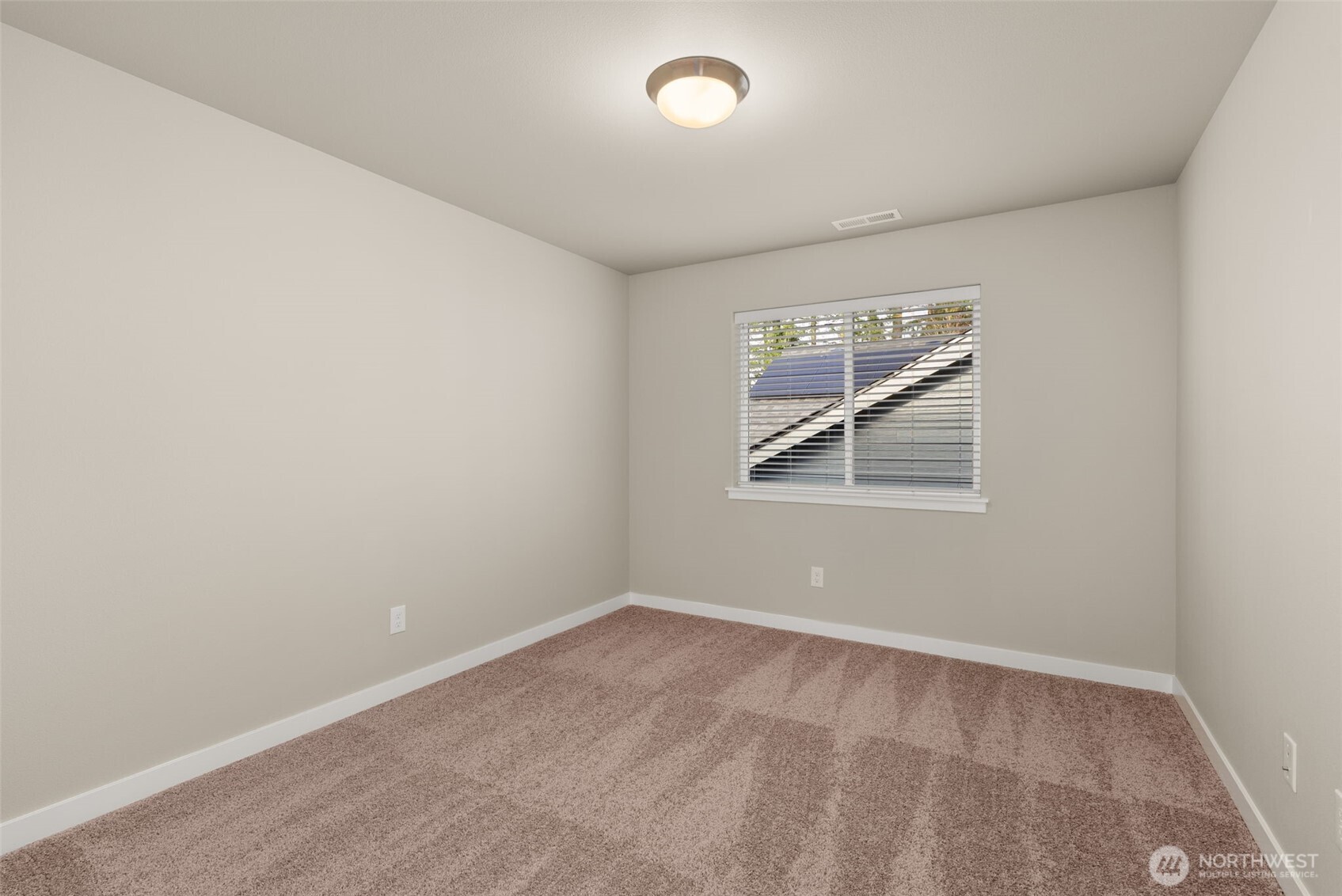 7308 Jenner Street Southwest Tumwater, WA 98512 - Photo 24 of 40 an empty room with windows