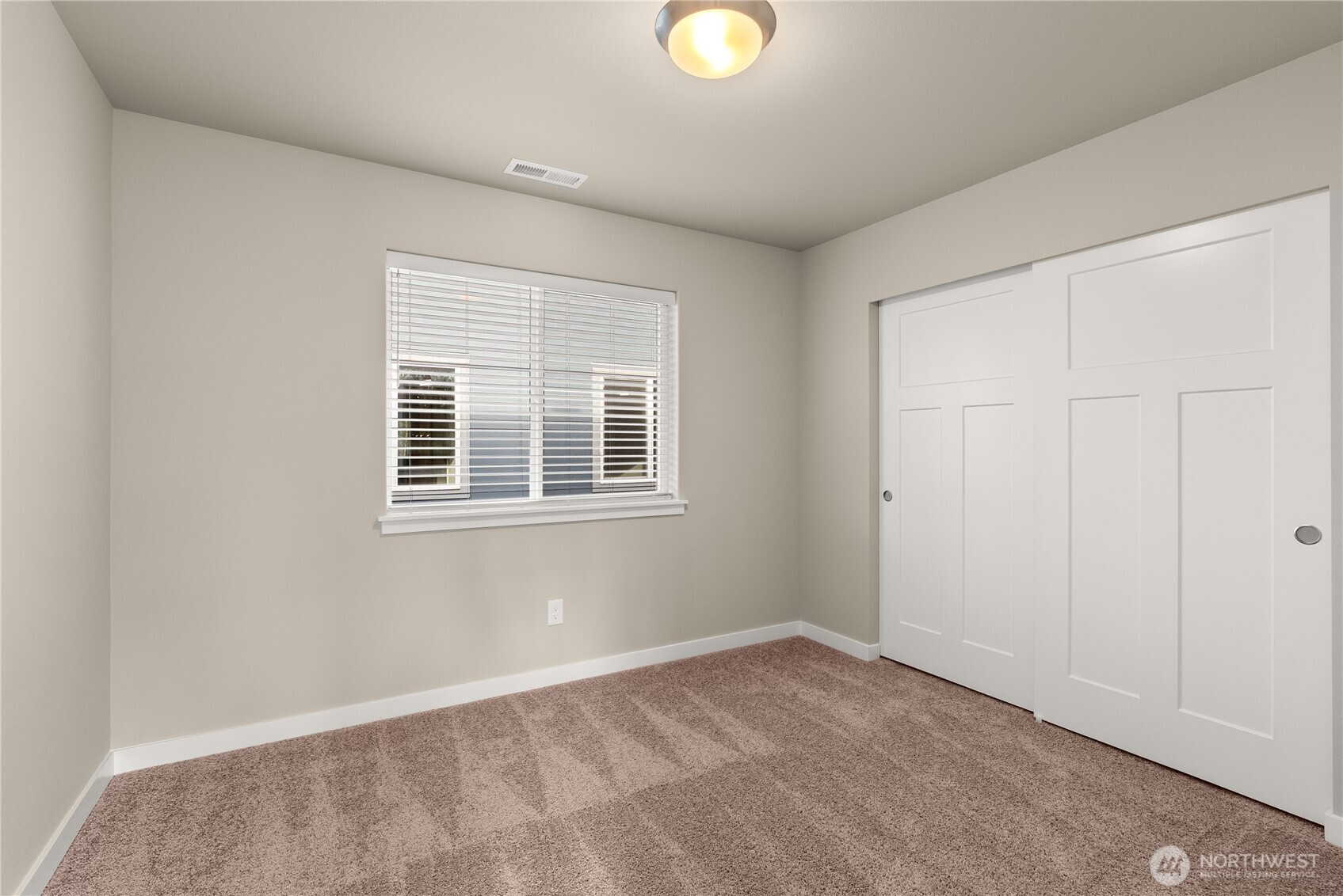 7308 Jenner Street Southwest Tumwater, WA 98512 - Photo 24 of 34 a view of a livingroom with a window