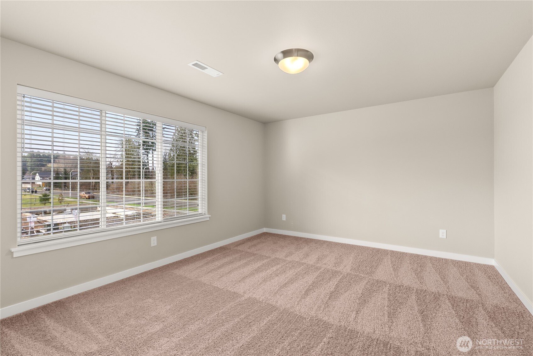7308 Jenner Street Southwest Tumwater, WA 98512 - Photo 25 of 34 an empty room with a window
