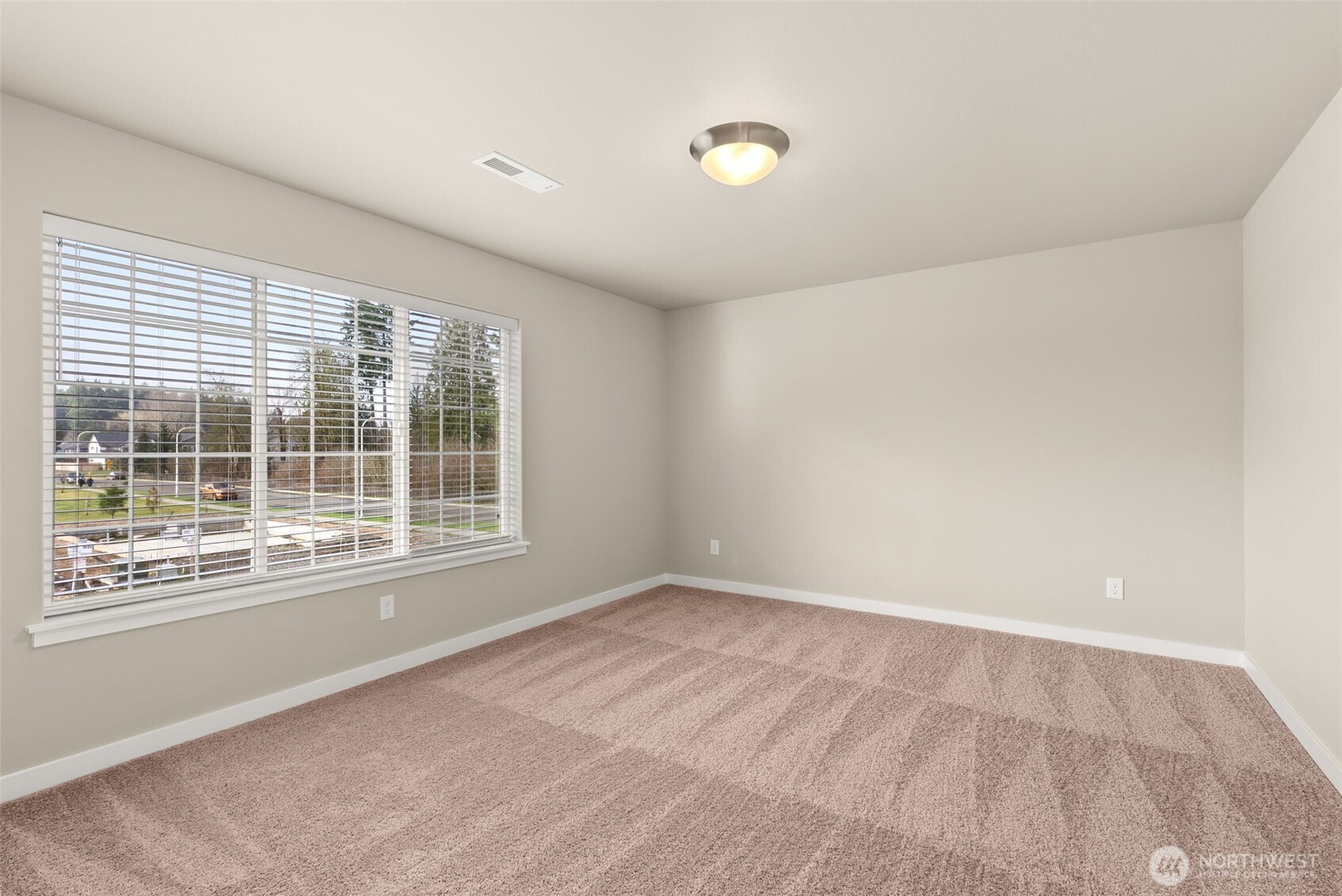 7308 Jenner Street Southwest Tumwater, WA 98512 - Photo 26 of 40 an empty room with a window