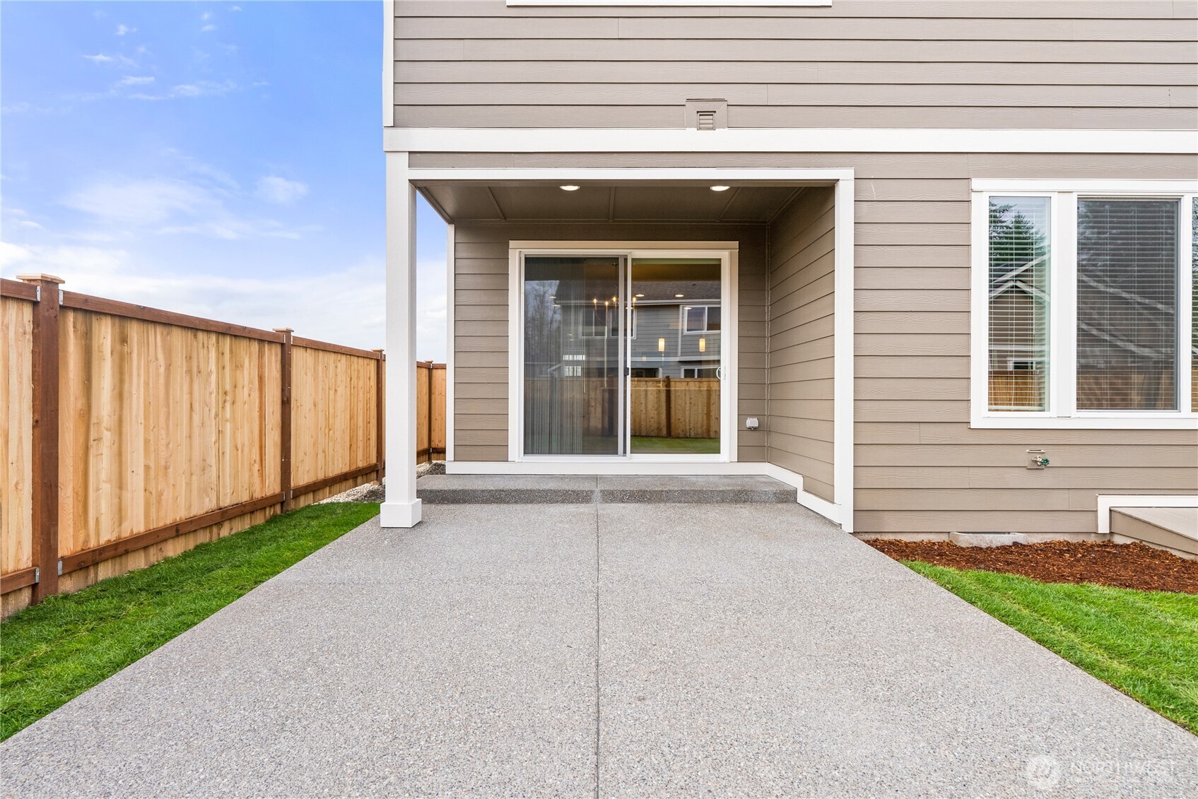 7308 Jenner Street Southwest Tumwater, WA 98512 - Photo 27 of 34 a view of a brick house with a large space