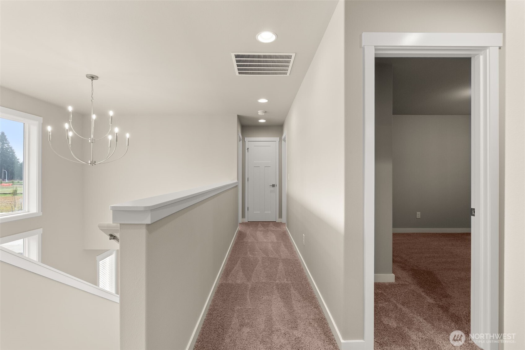 7308 Jenner Street Southwest Tumwater, WA 98512 - Photo 28 of 40 a view of a hallway