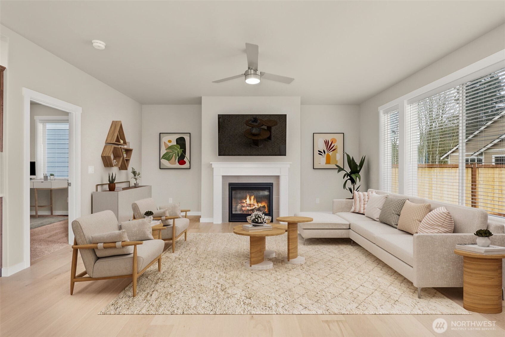 7308 Jenner Street Southwest Tumwater, WA 98512 - Photo 3 of 40 a living room with furniture a fireplace and a flat screen tv