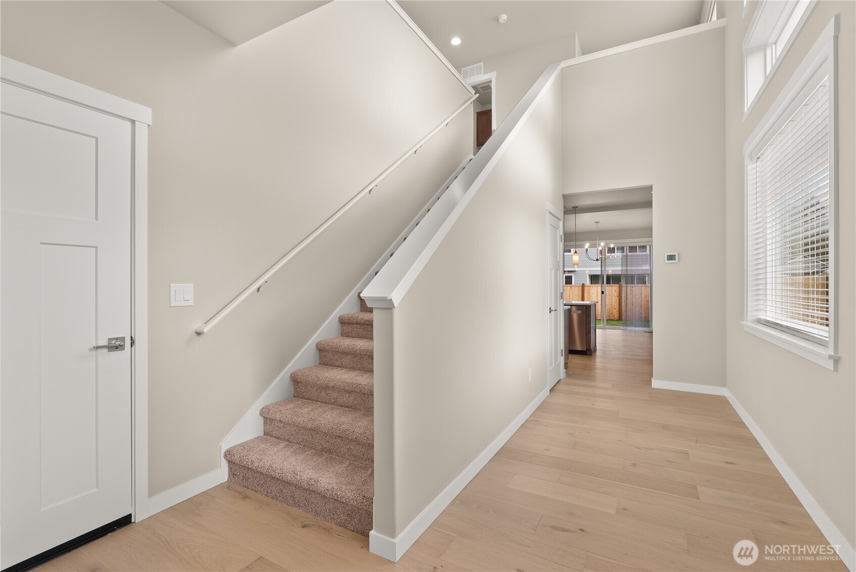7308 Jenner Street Southwest Tumwater, WA 98512 - Photo 4 of 34 a view of entryway and hall with wooden floor