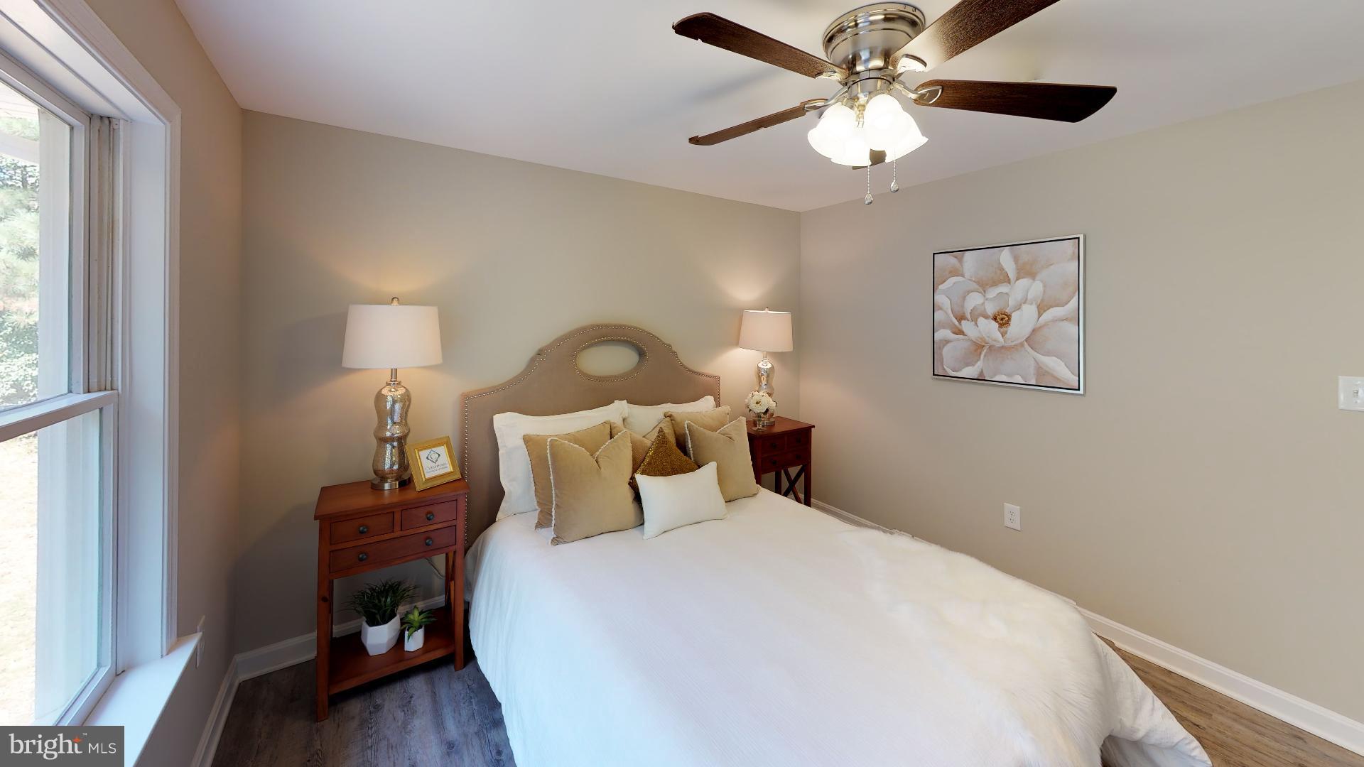 13284 Joy Road Lusby, MD 20657 - Photo 12 of 29 a bedroom with a bed and a window