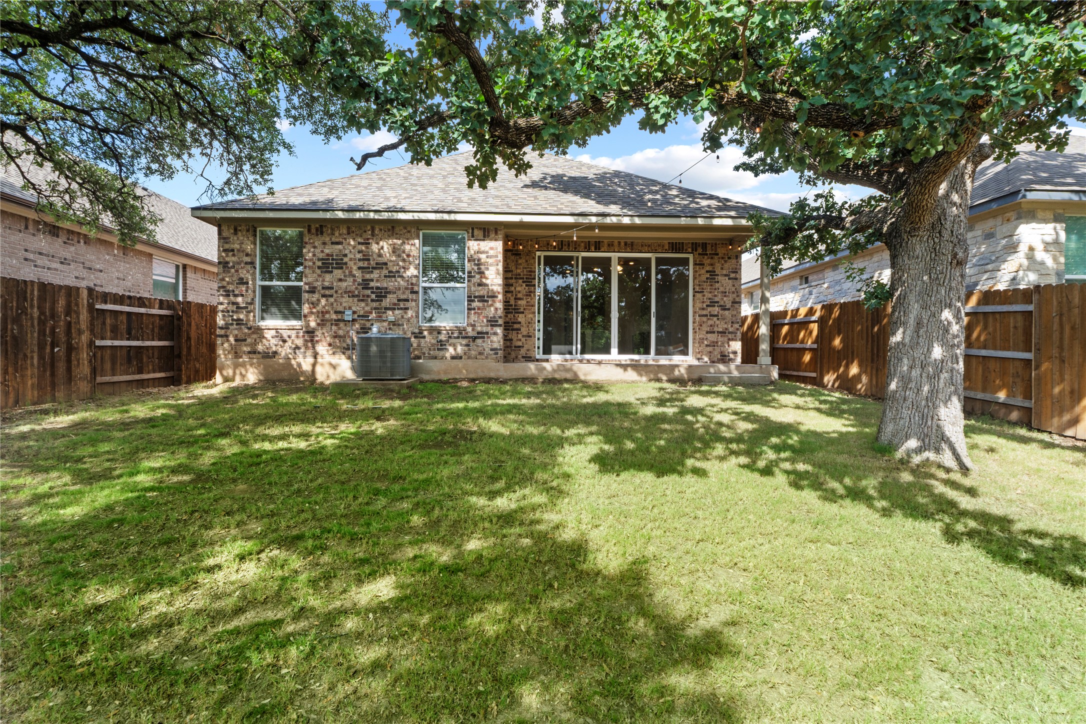 341 Peace Pipe Way Georgetown, TX 78628 - Photo 26 of 28 Enjoy the shade and covered front porch.