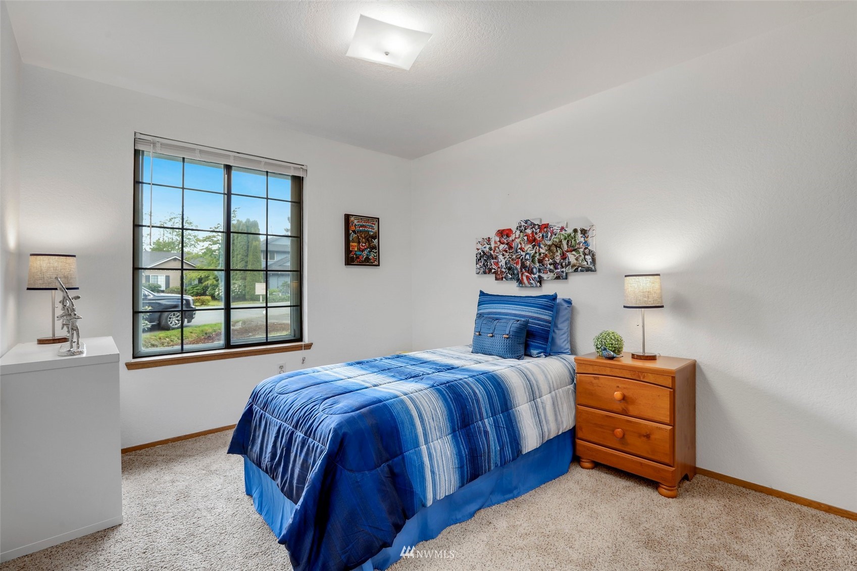 529 164th Place Southeast Bothell, WA 98012 - Photo 13 of 26 a bedroom with a bed and a window