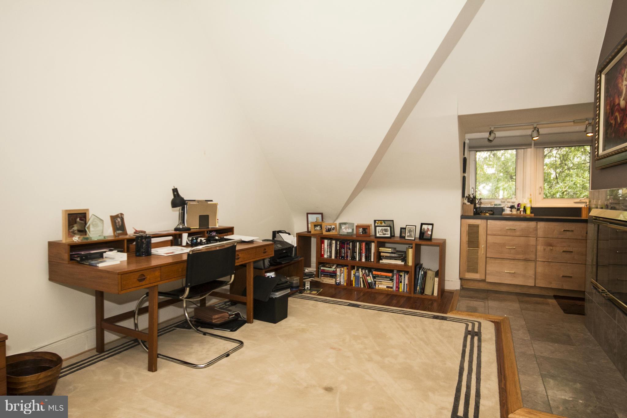 3957 Cloverhill Road Baltimore, MD 21218 - Photo 22 of 30 a view of a workspace with furniture