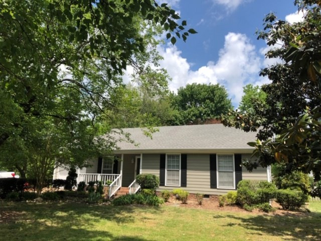1024 Robinfield Drive Raleigh, NC 27603 - Photo 1 of 26 Front Elevation with Welcoming Covered Porch