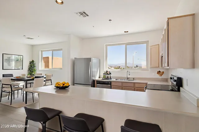 a view of storage and utility room with washer and dryer
