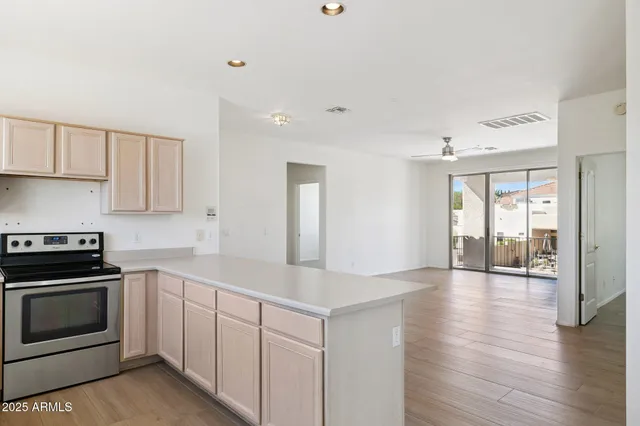 a view of kitchen with wooden floor