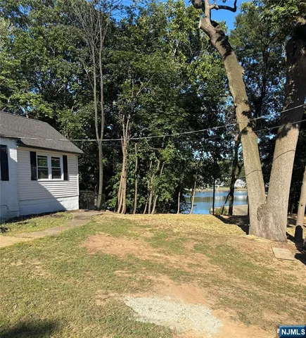 a view of a backyard of a house