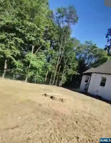 a view of an empty room with stairs