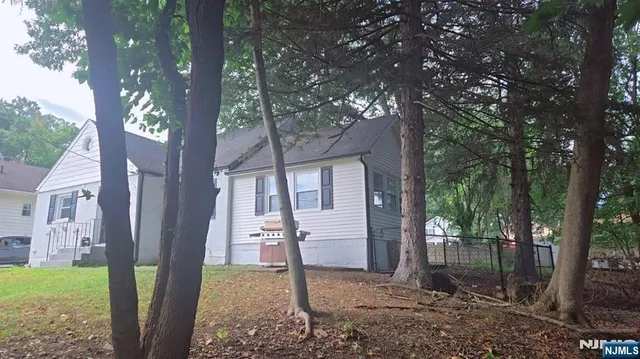 a backyard of a house with seating space