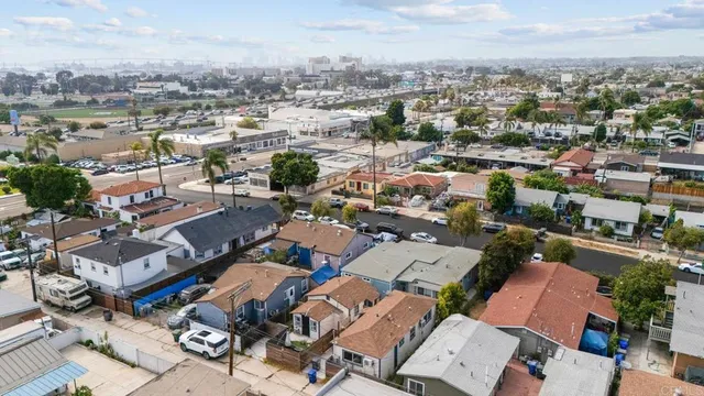 an aerial view of a city with lots of residential buildings