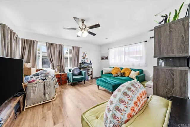 a kitchen with sink refrigerator and stove