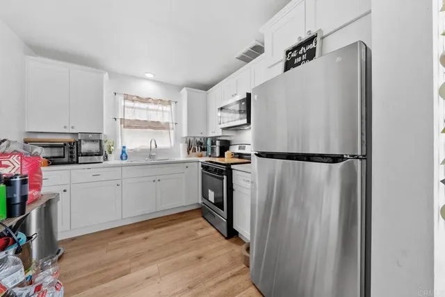 a bedroom with a bed and a closet